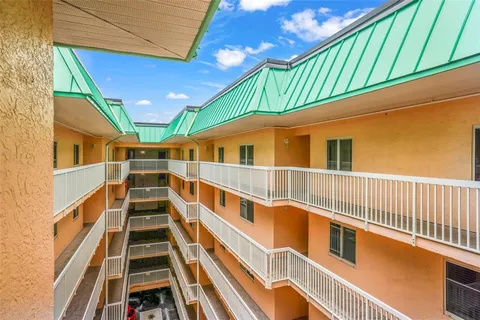 a view of a house with a street