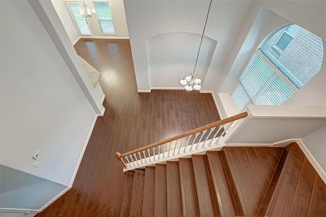 a view of entryway and kitchen