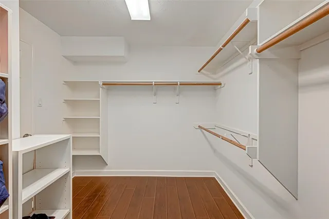 a view of an empty walk in closet