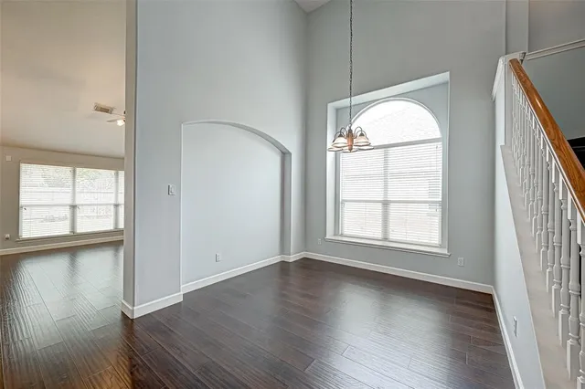 a bathroom with a sink vanity and mirror