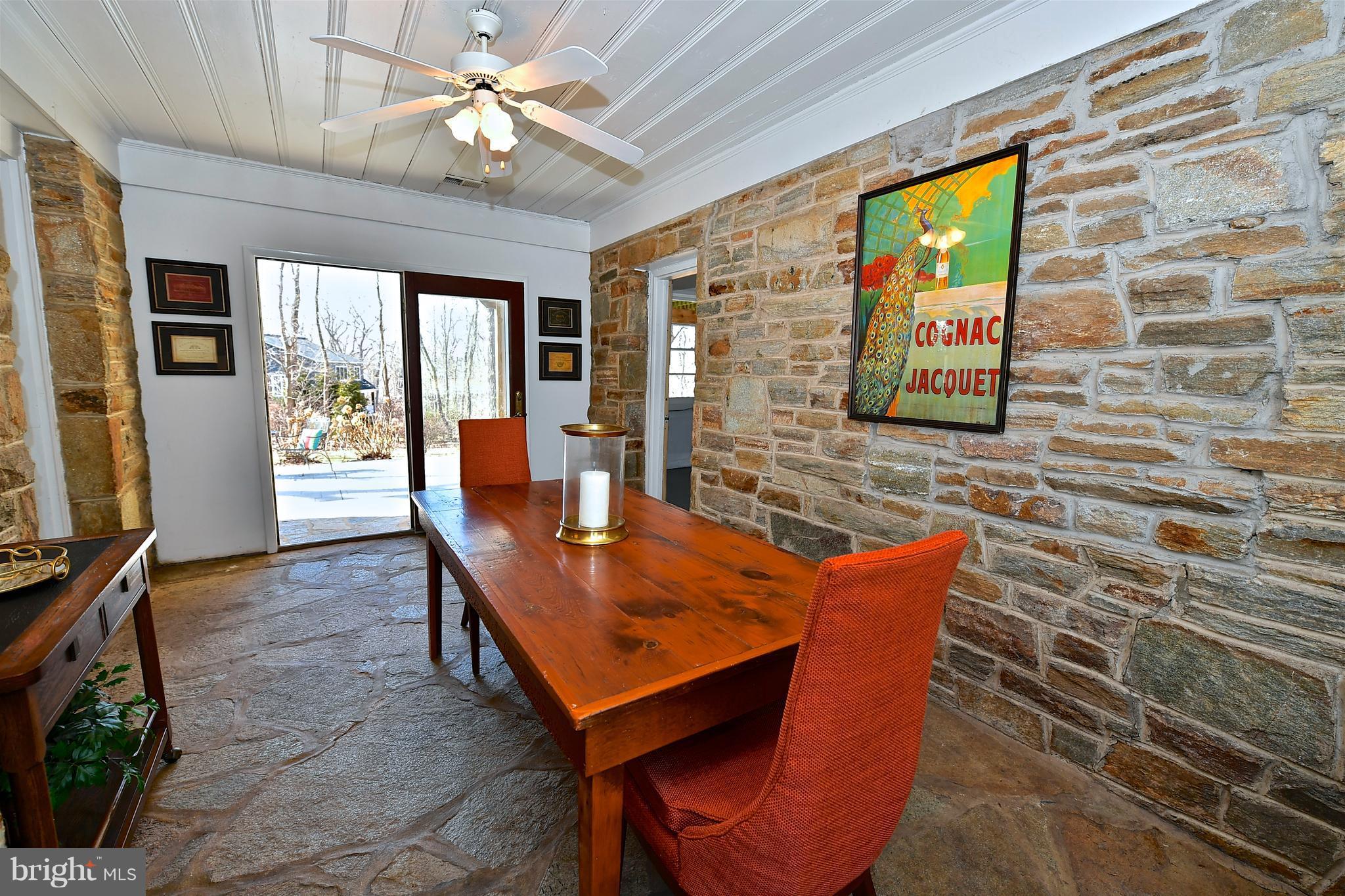 16528 Dubbs Road Sparks, MD 21152 - Photo 10 of 30 Unique Stone Breezeway off Kitchen (set as DR)