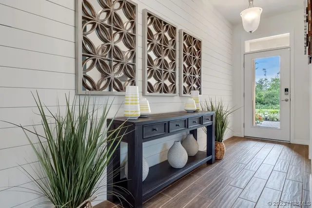 a view of a entryway with wooden floor