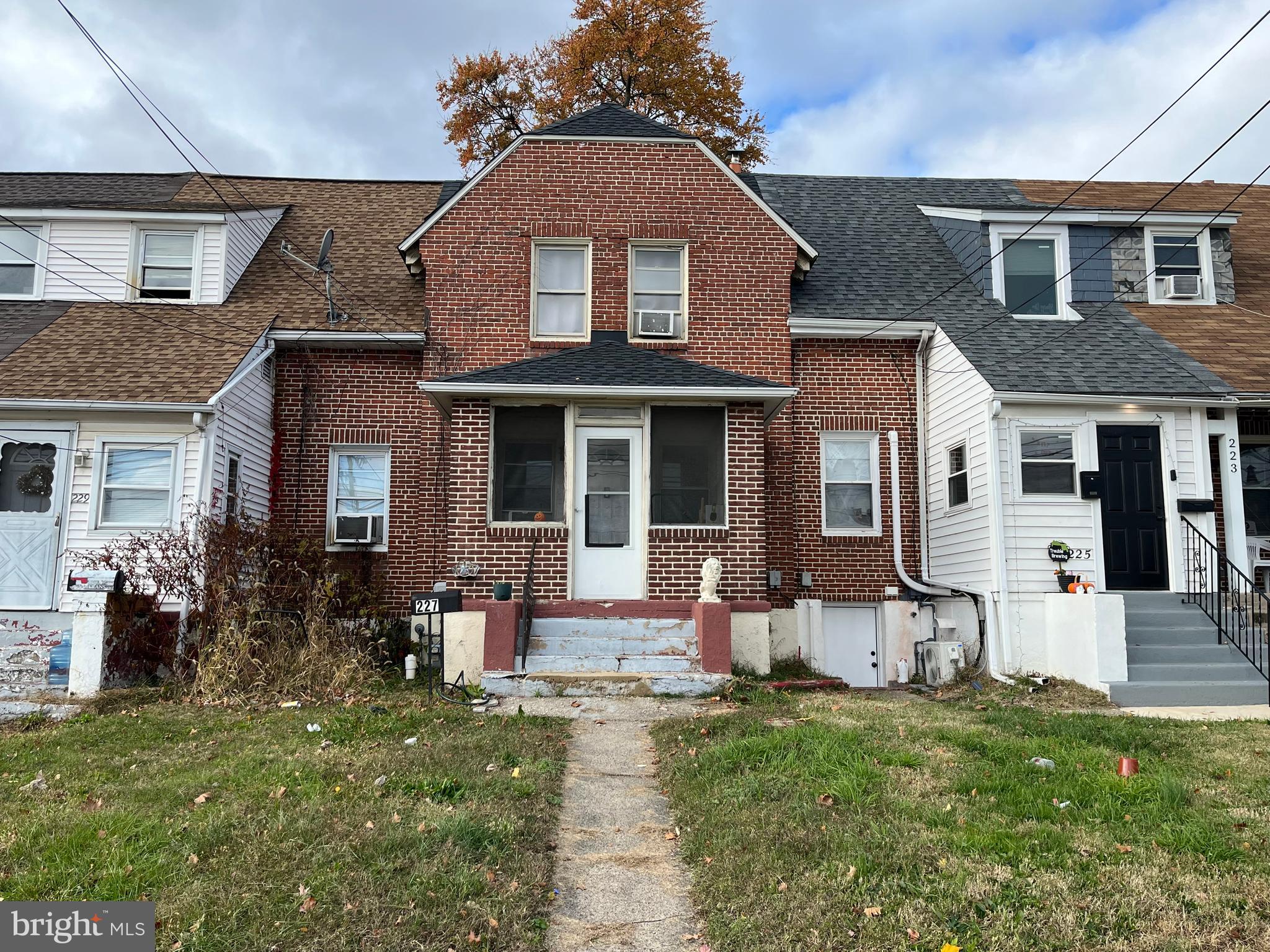 227 Ridge Road Claymont, DE 19703 - Photo 1 of 18 a front view of a house with a yard