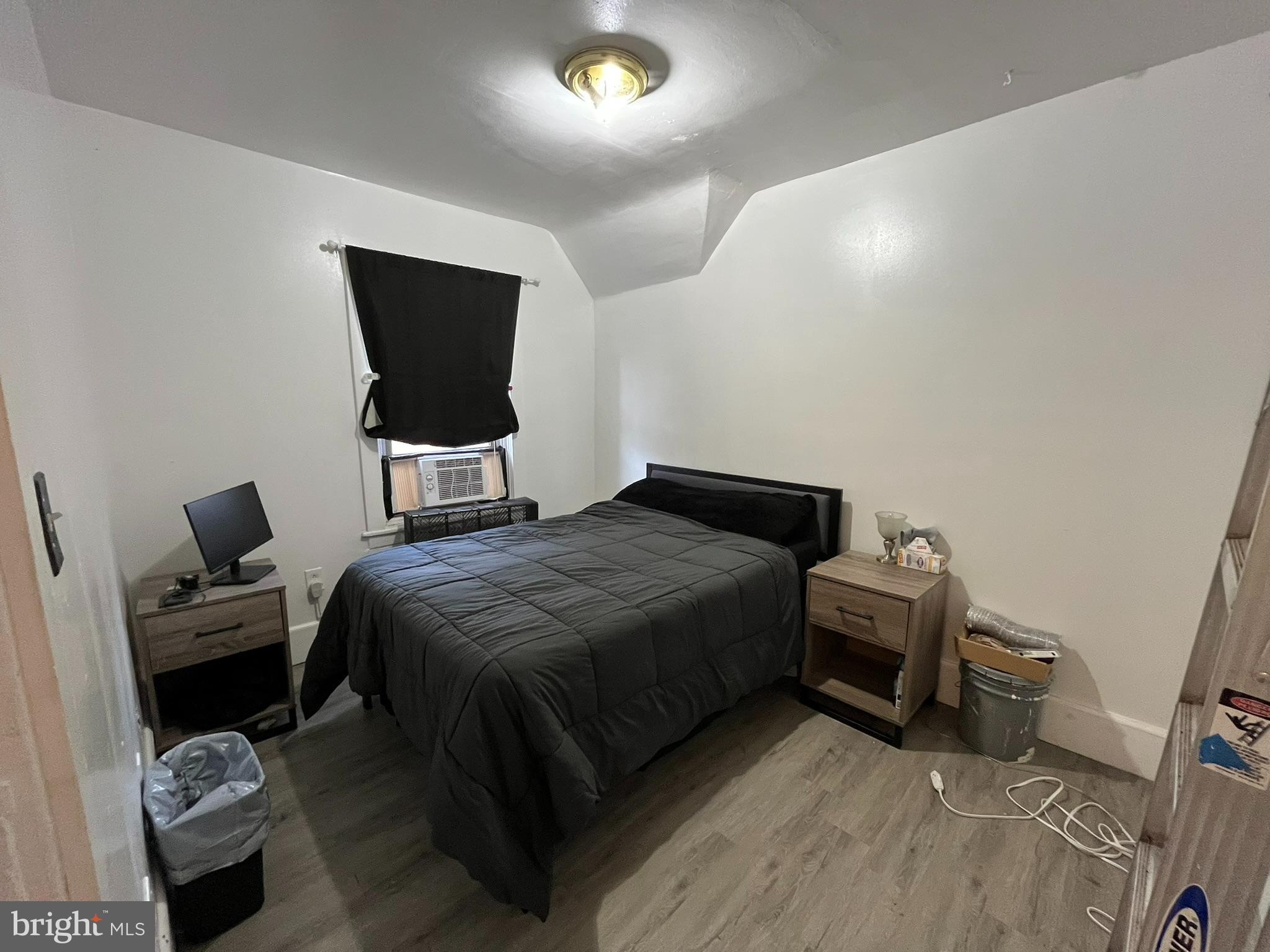 227 Ridge Road Claymont, DE 19703 - Photo 12 of 18 a bedroom with a bed and a television