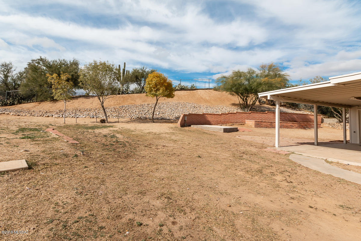 7761 North Rasmussen Avenue Tucson, AZ 85741 - Photo 23 of 23 a view of a backyard of the house