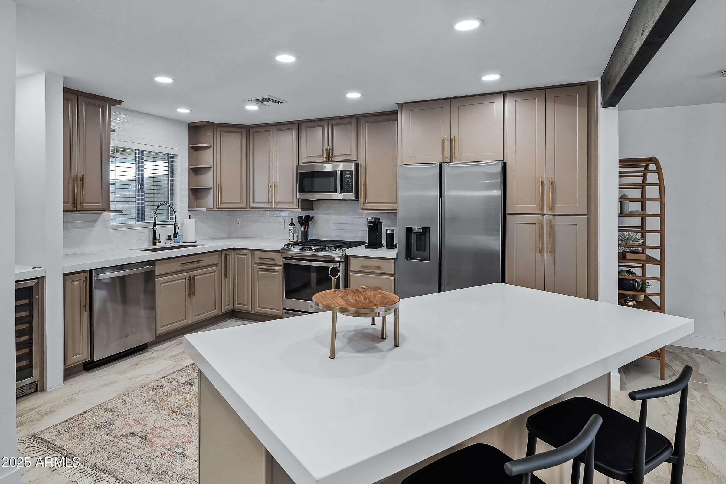 7308 North 7th Avenue Phoenix, AZ 85021 - Photo 11 of 42 a large kitchen with a table and chairs