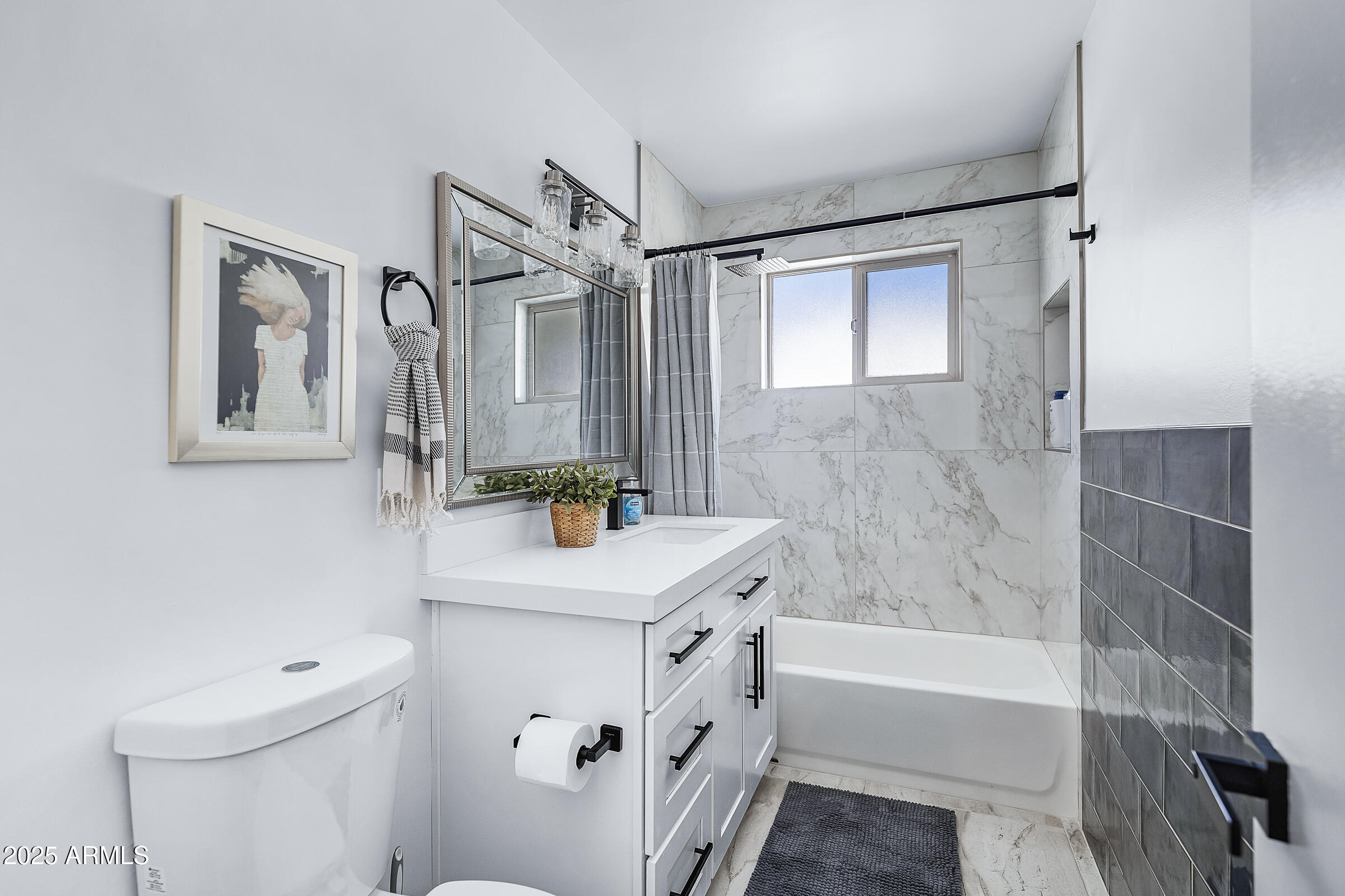 7308 North 7th Avenue Phoenix, AZ 85021 - Photo 25 of 42 a bathroom with a sink a toilet and shower