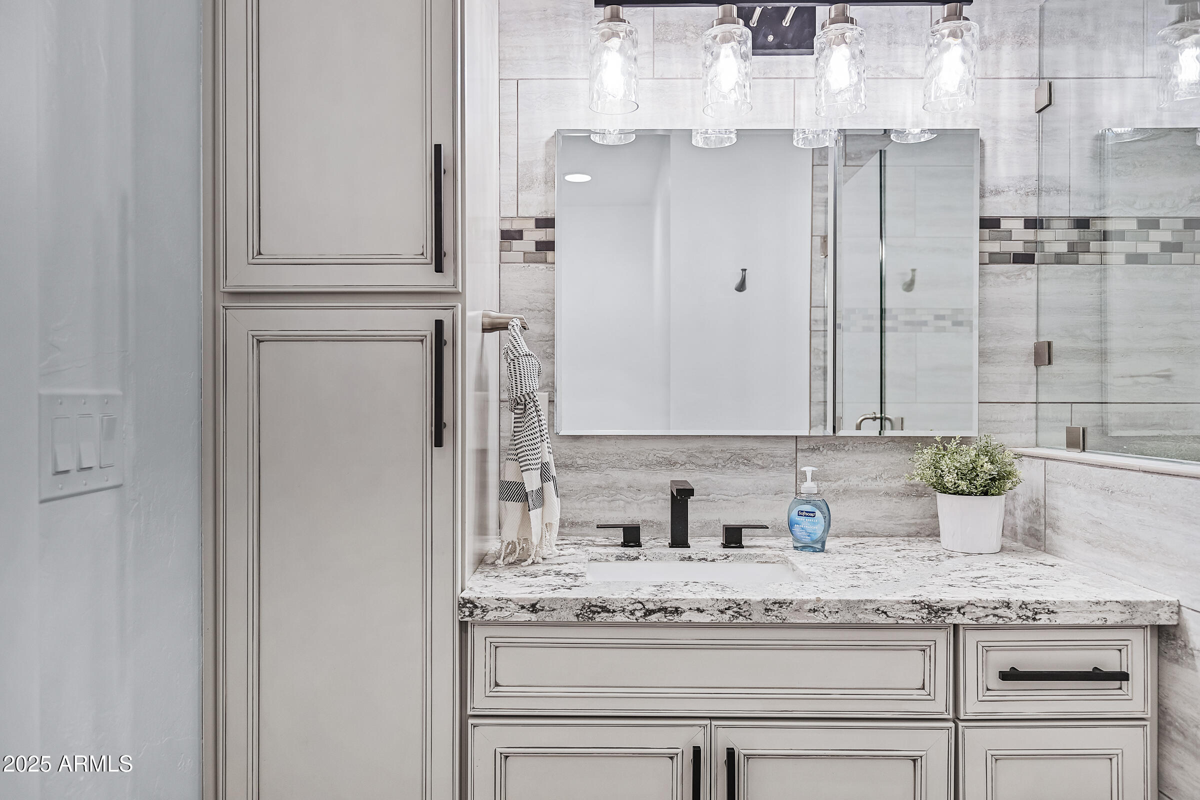 7308 North 7th Avenue Phoenix, AZ 85021 - Photo 34 of 42 a bathroom with a granite countertop sink and a mirror
