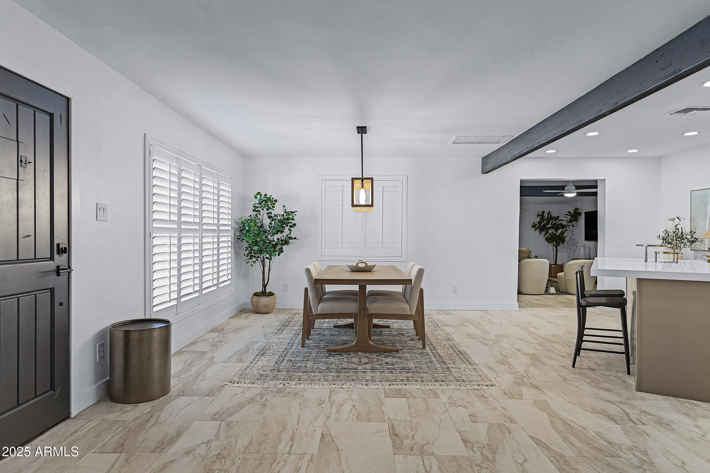 7308 North 7th Avenue Phoenix, AZ 85021 - Photo 6 of 42 a dining room with furniture and window