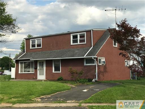 3 Brookville Road Edison, NJ 08817 - Photo 1 of 19 a front view of a house with garden