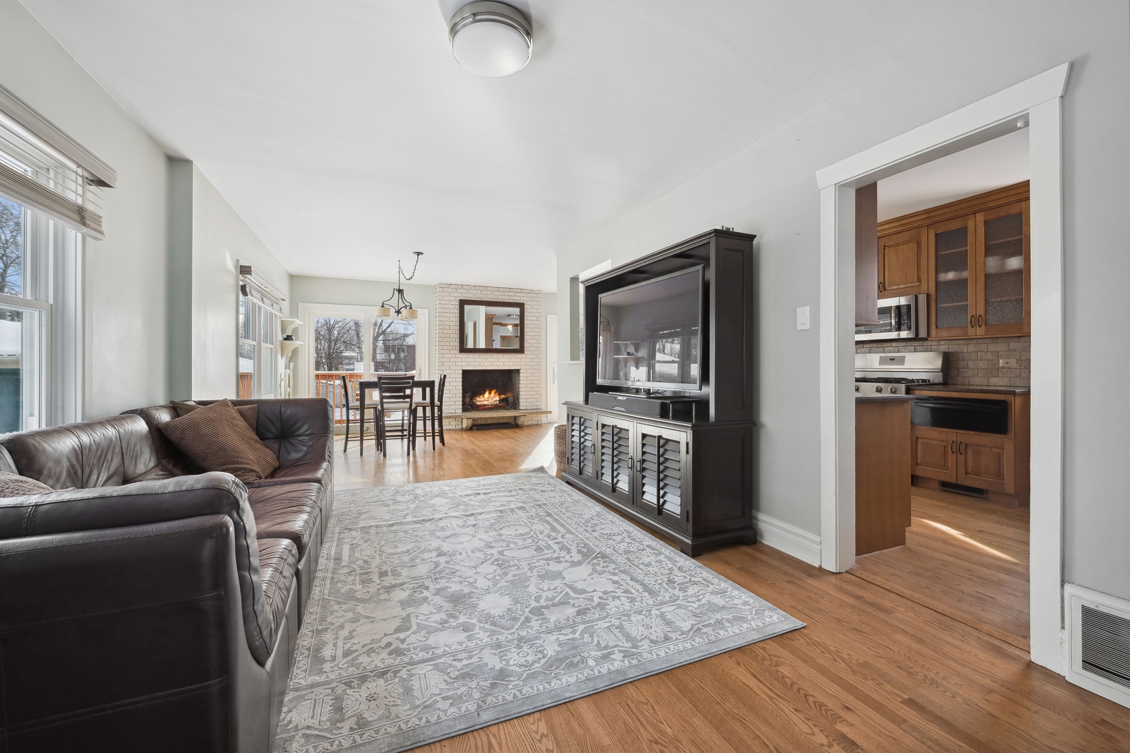 413 Addison Road Riverside, IL 60546 - Photo 7 of 33 a living room with furniture and a wooden floor
