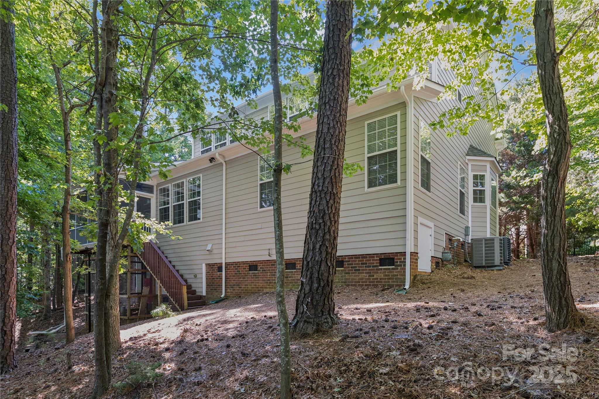 1627 Scotch Pine Lane Tega Cay, SC 29708 - Photo 38 of 48 a view of a house with a yard and large tree