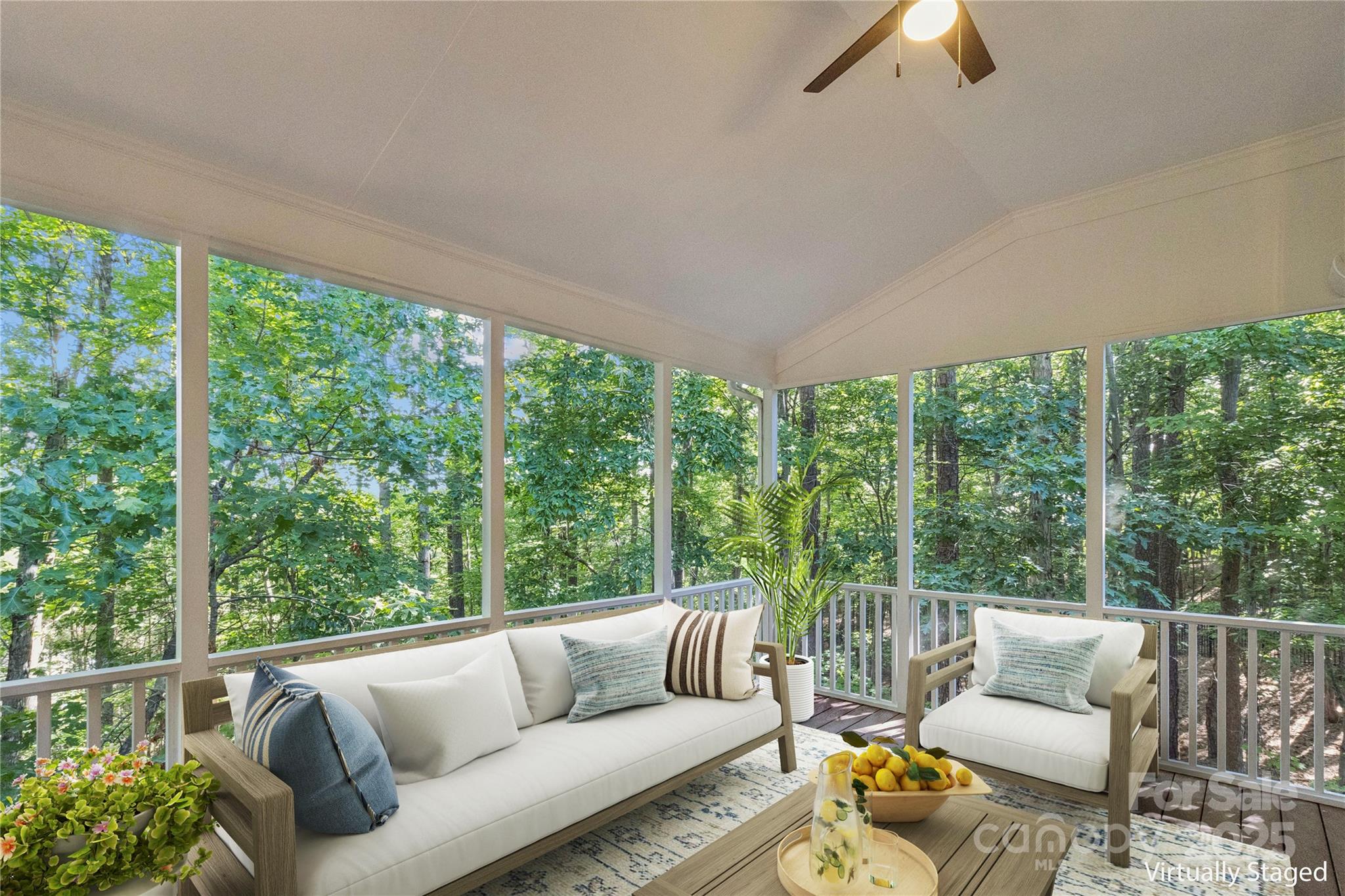 1627 Scotch Pine Lane Tega Cay, SC 29708 - Photo 40 of 48 a living room with furniture and a large window