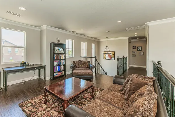 a bedroom with a bed closet and flat tv screen