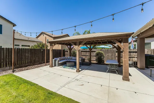 a view of a house with a patio