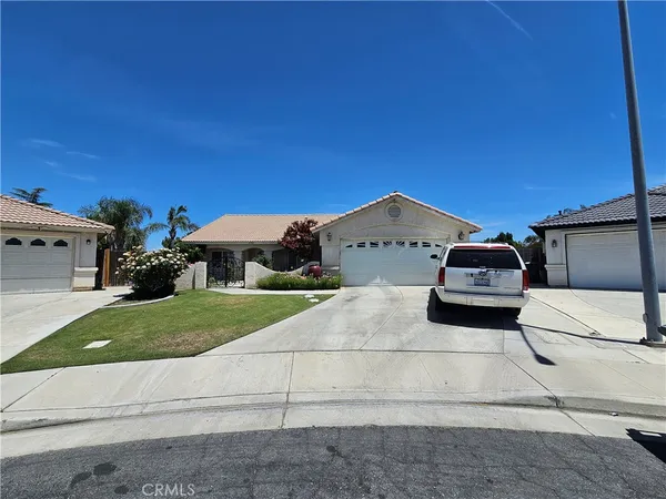a car parked in front of a house