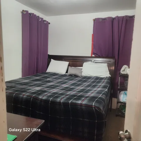 a bathroom with a toilet and a sink