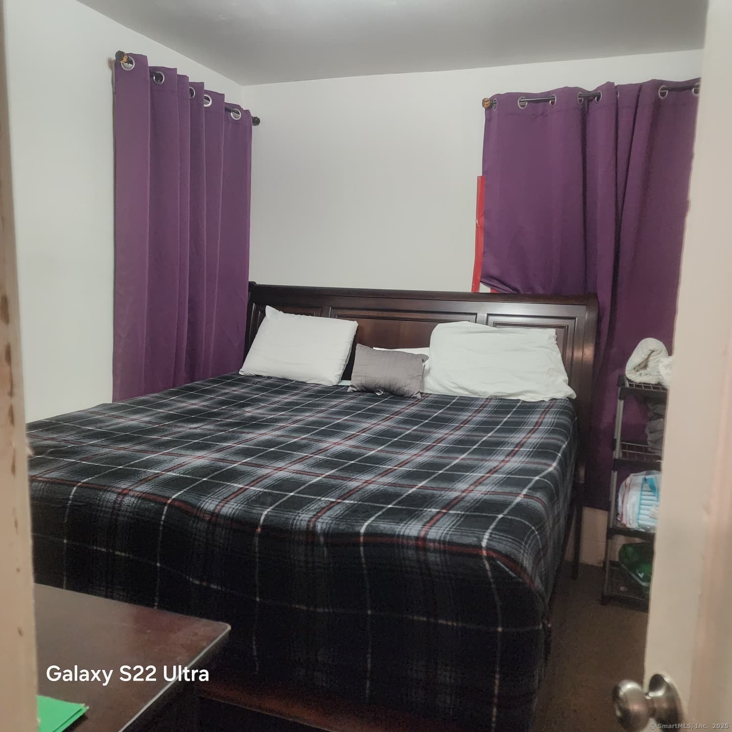 68 Edwin Street Bridgeport, CT 06607 - Photo 11 of 23 a bedroom with a bed and a closet