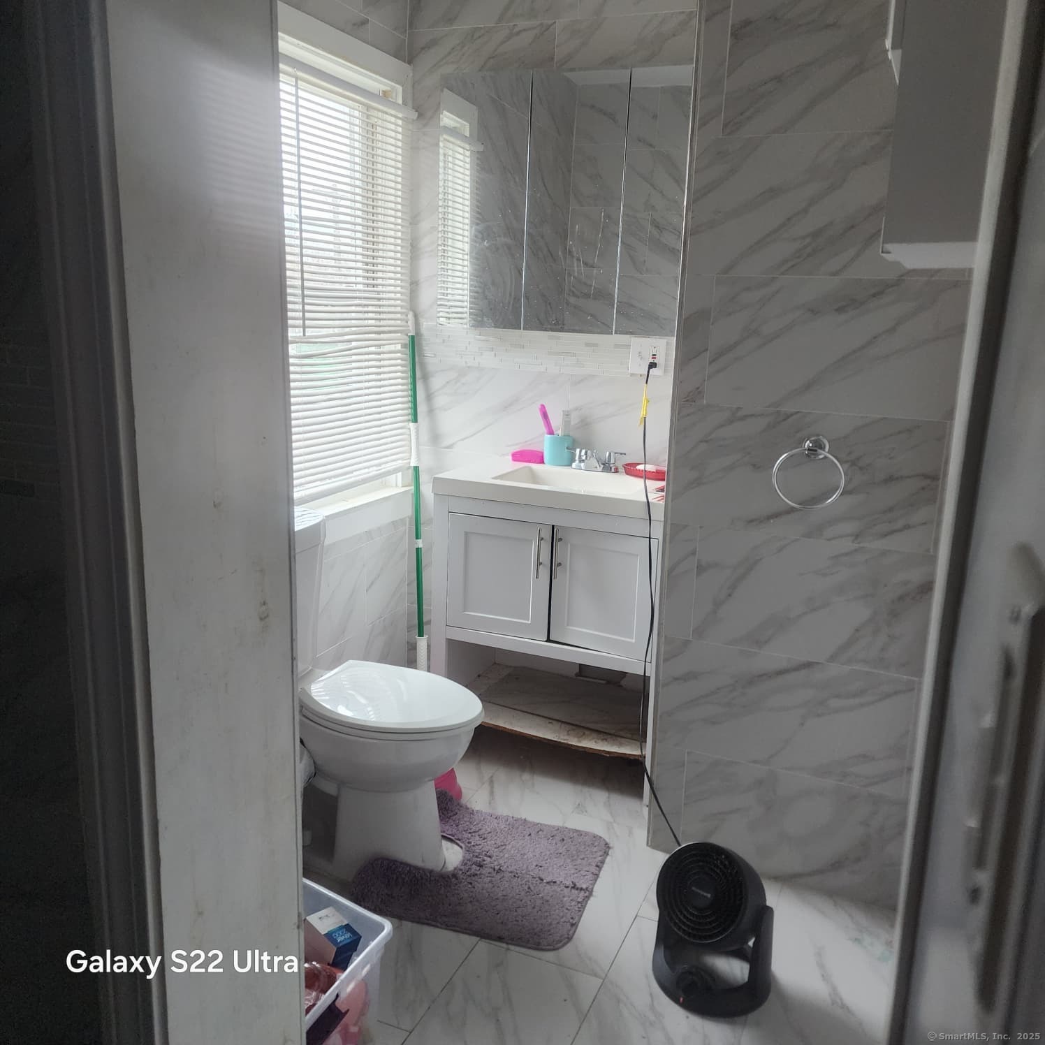 68 Edwin Street Bridgeport, CT 06607 - Photo 13 of 23 a bathroom with a sink and a toilet