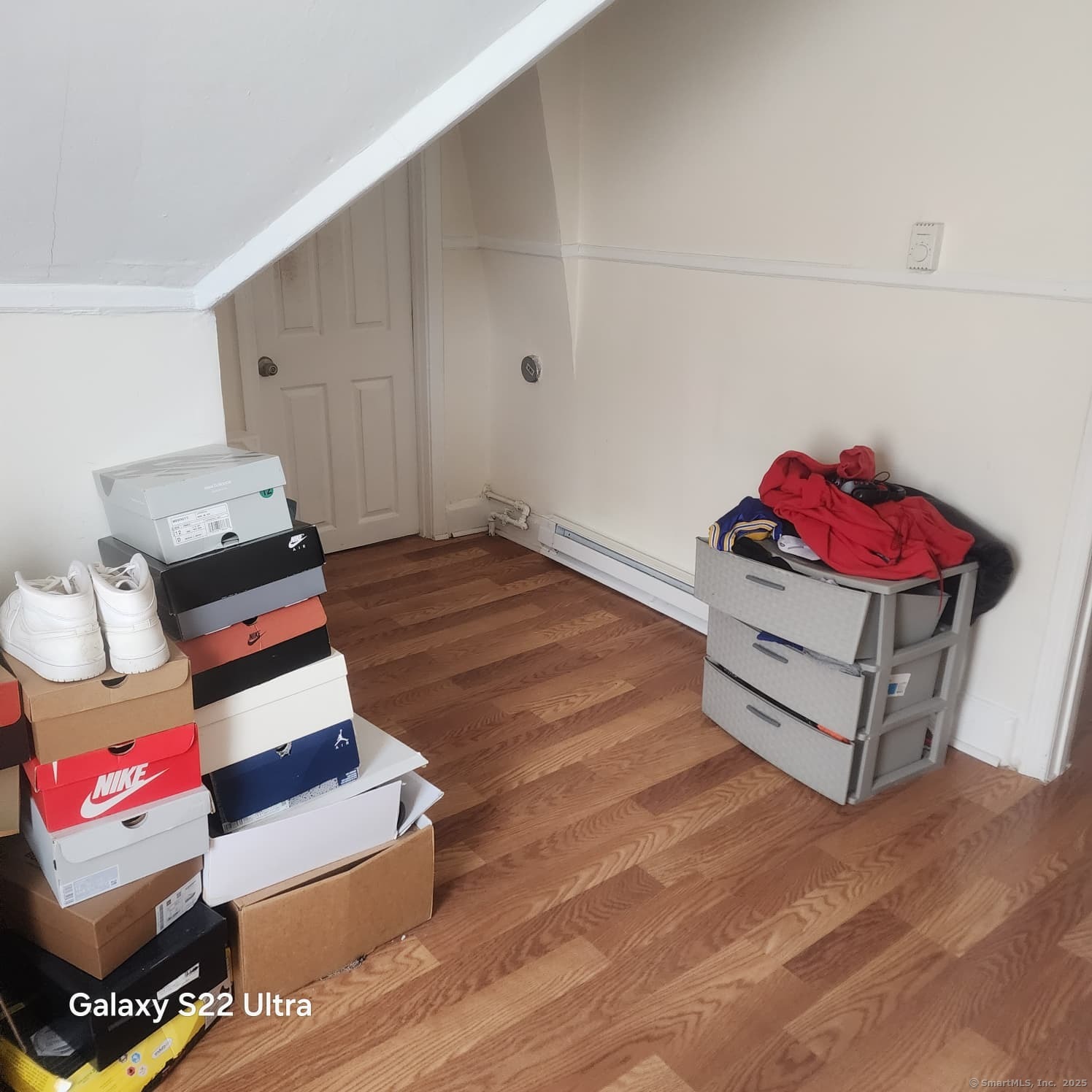 68 Edwin Street Bridgeport, CT 06607 - Photo 17 of 23 a living room with furniture and a wooden floor