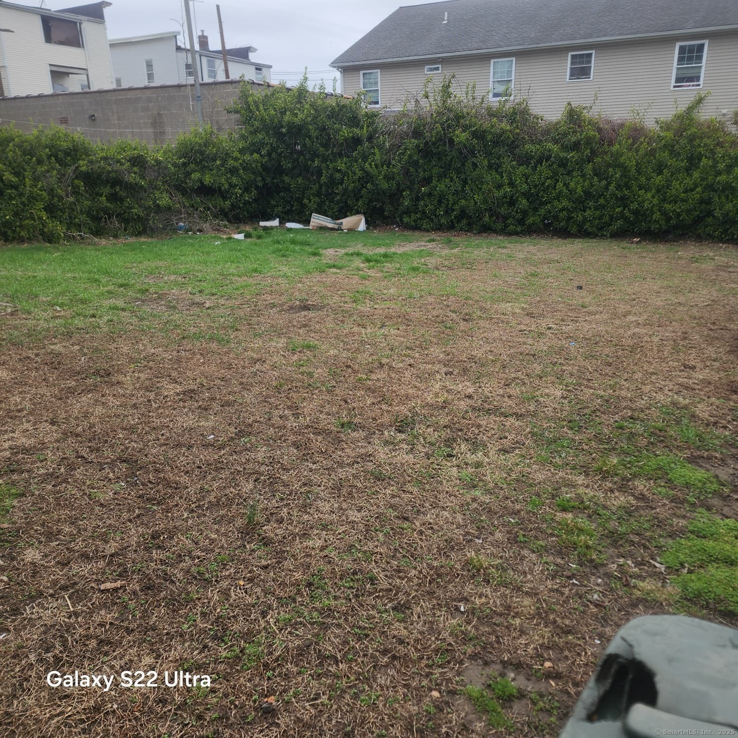 68 Edwin Street Bridgeport, CT 06607 - Photo 22 of 23 a view of a yard with a house