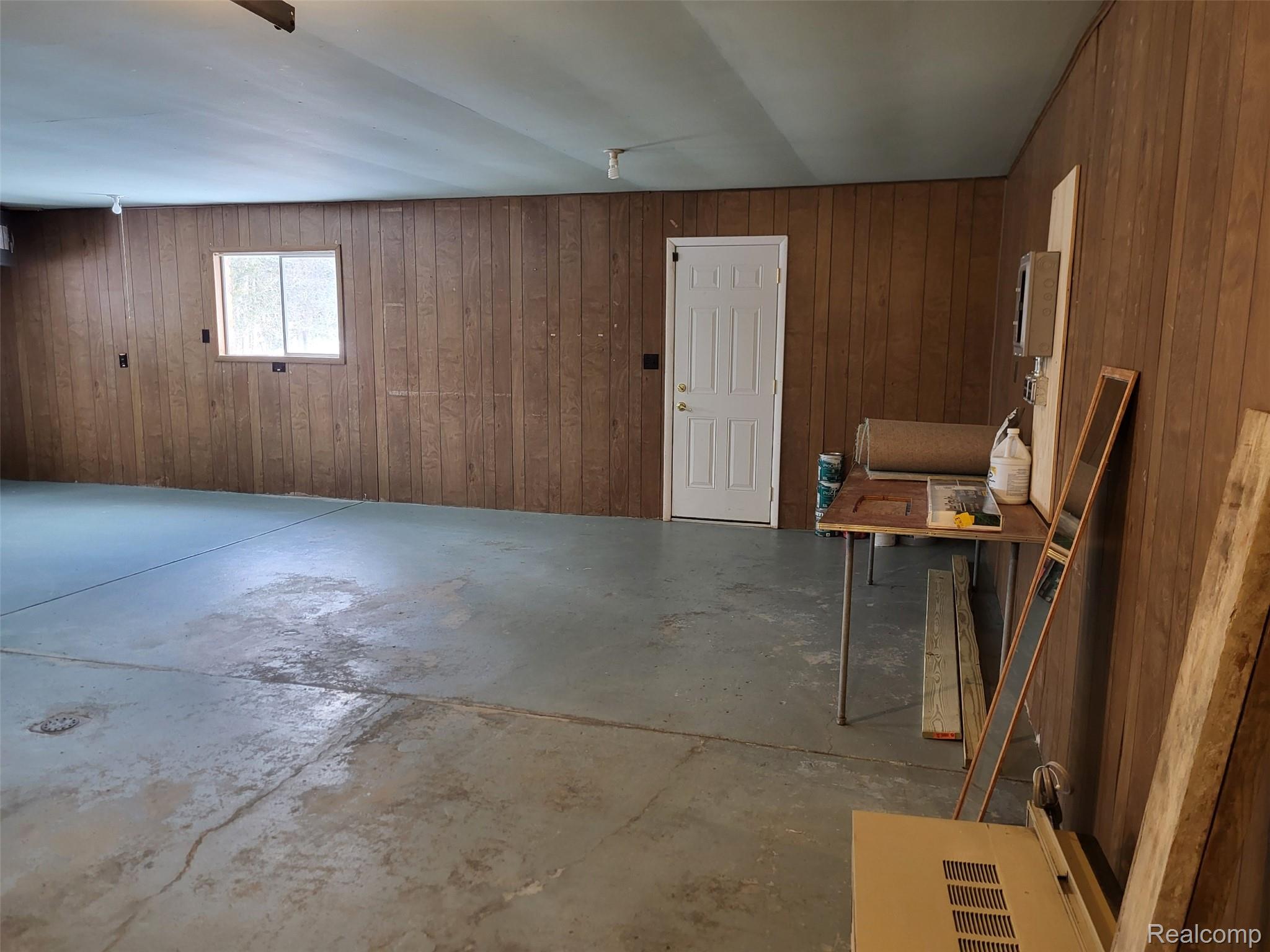 4662 North Lapeer Road Columbiaville, MI 48421 - Photo 16 of 19 Below grade area featuring wood walls