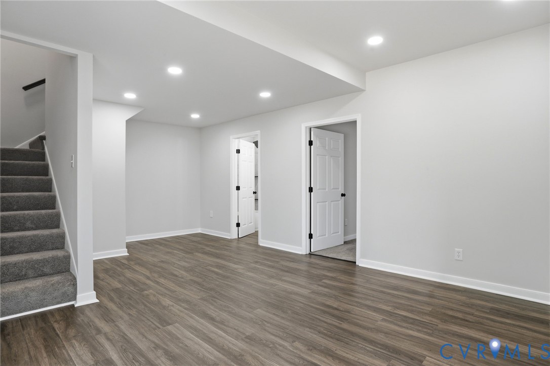 3490 Willow Brook Road Bumpass, VA 23024 - Photo 22 of 29 a view of an empty room with wooden floor and entryway