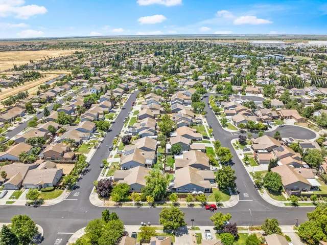 an aerial view of residential building with outdoor space