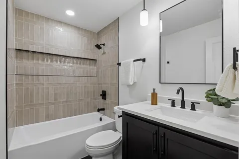 a hallway with cabinets