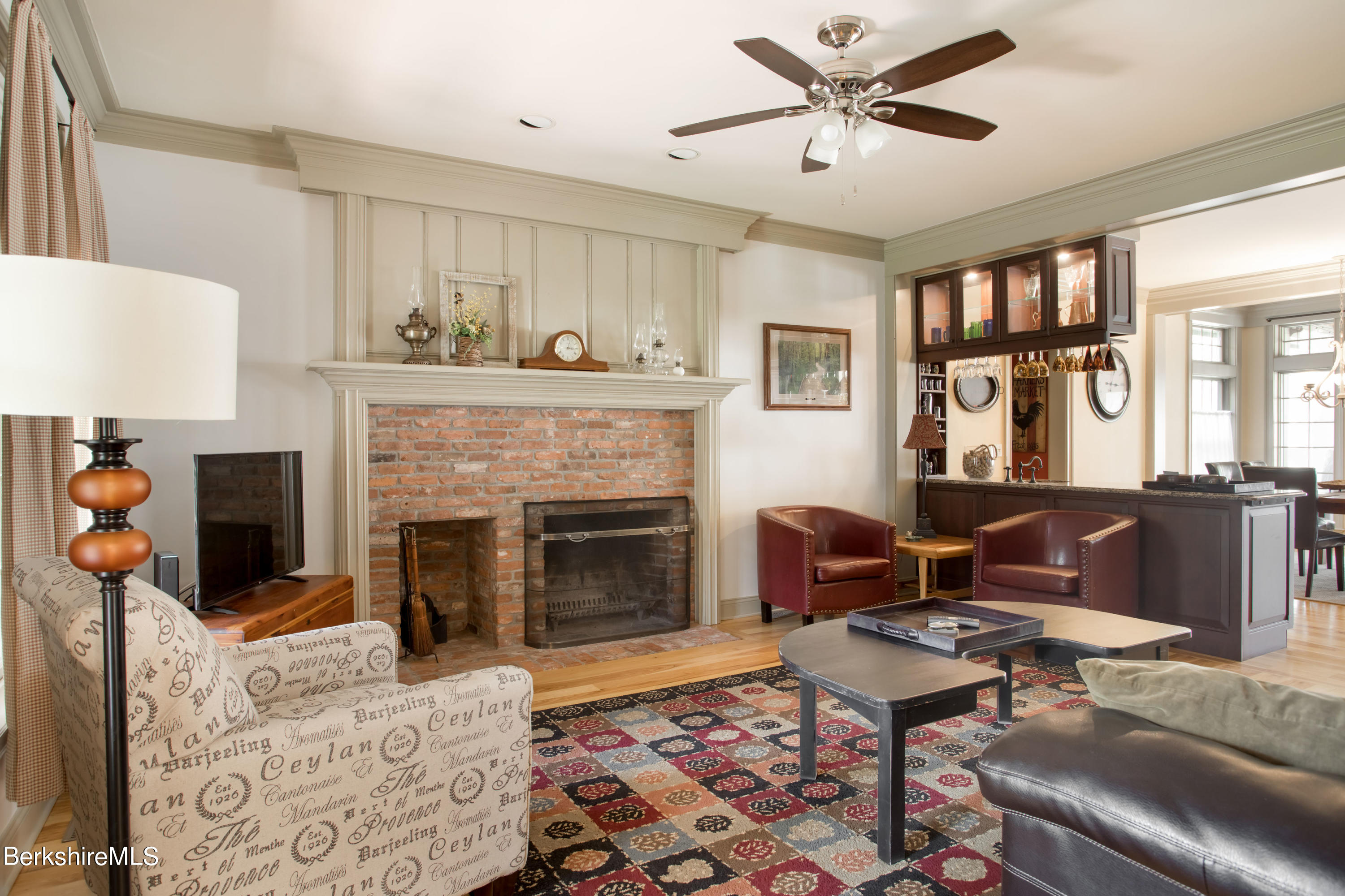 357 Twin Lakes Road Salisbury, CT 06068 - Photo 16 of 31 a living room with furniture and a fireplace
