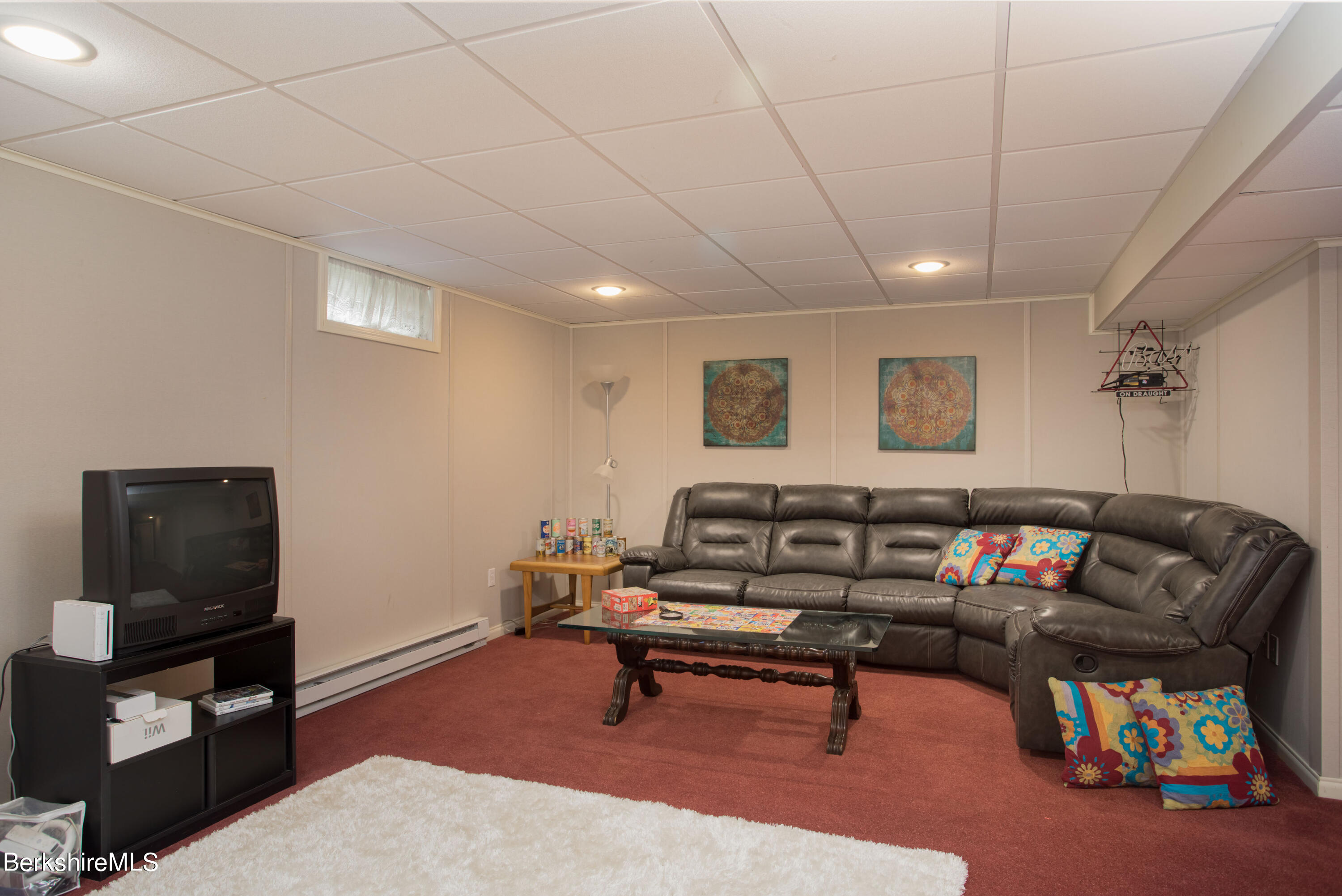 357 Twin Lakes Road Salisbury, CT 06068 - Photo 29 of 31 a living room with furniture and a flat screen tv