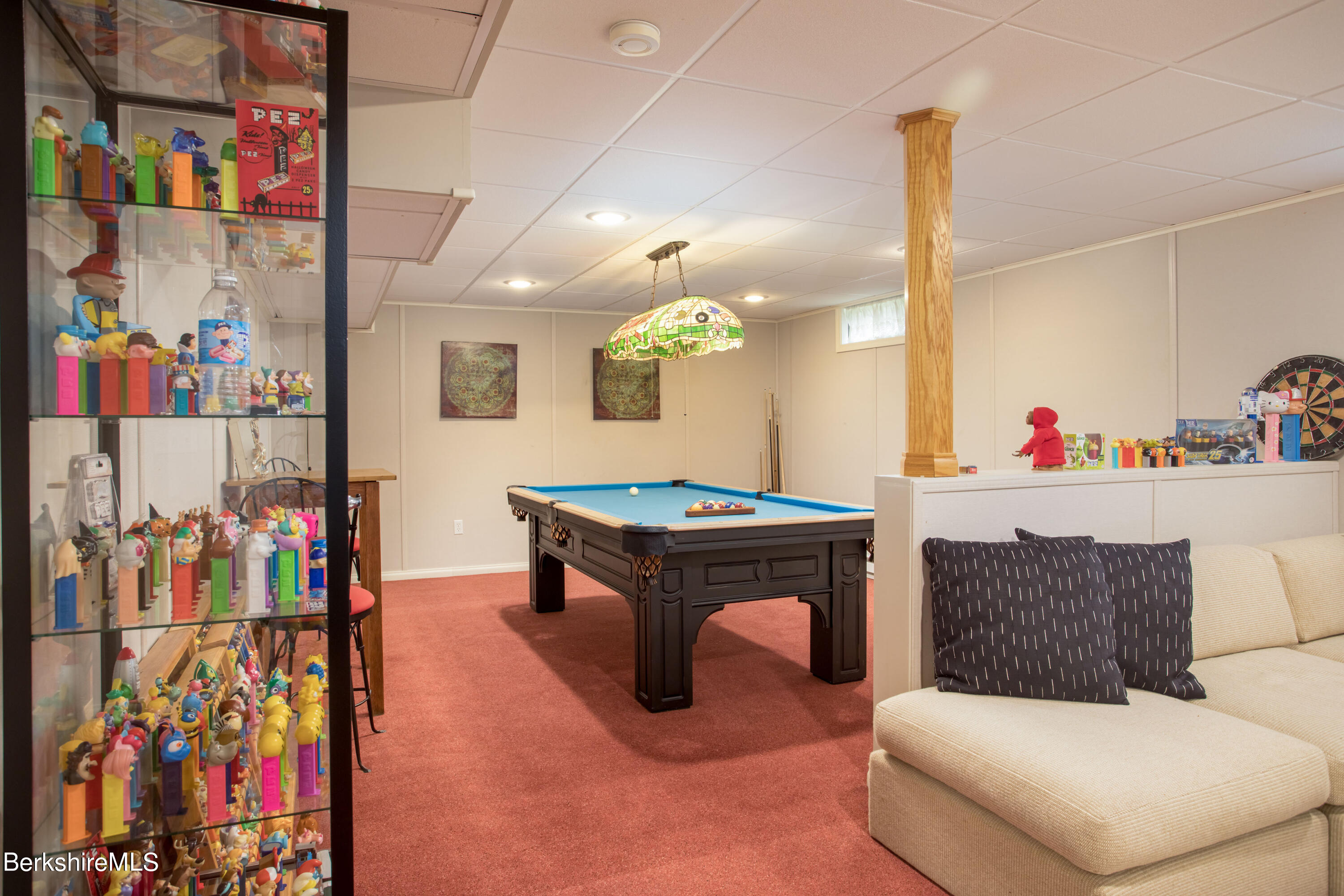 357 Twin Lakes Road Salisbury, CT 06068 - Photo 30 of 31 a living room with furniture and a couch