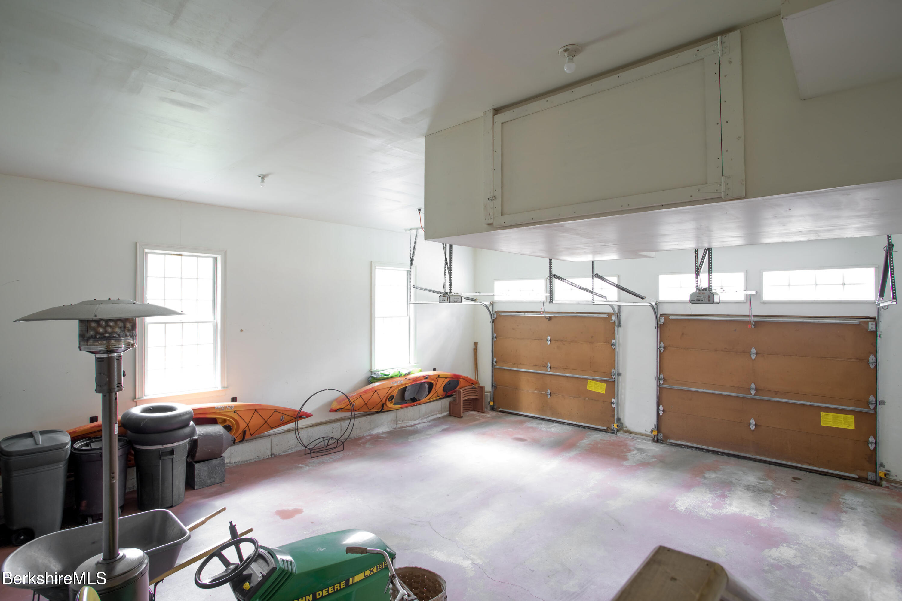 357 Twin Lakes Road Salisbury, CT 06068 - Photo 31 of 31 a bedroom with a bed and a chandelier