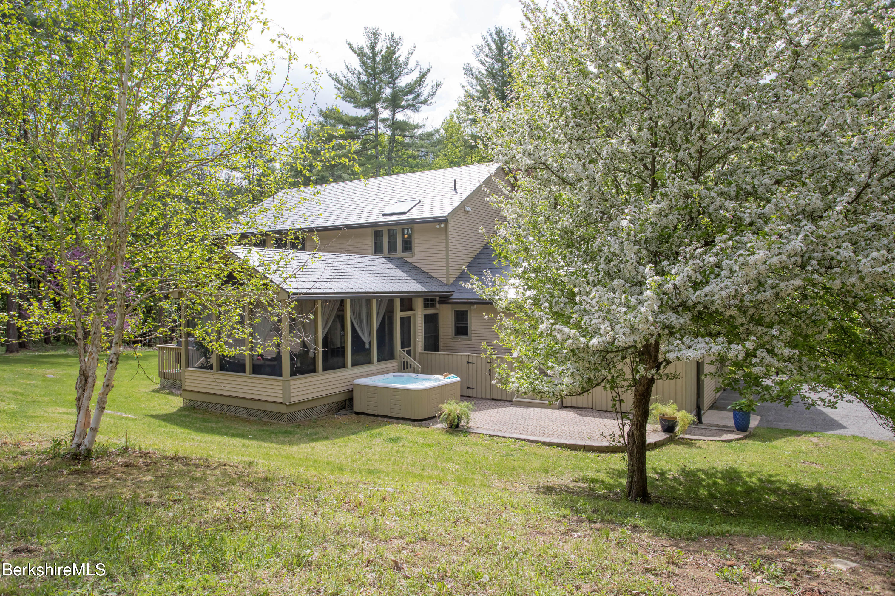 357 Twin Lakes Road Salisbury, CT 06068 - Photo 5 of 31 a view of a house with backyard and sitting area