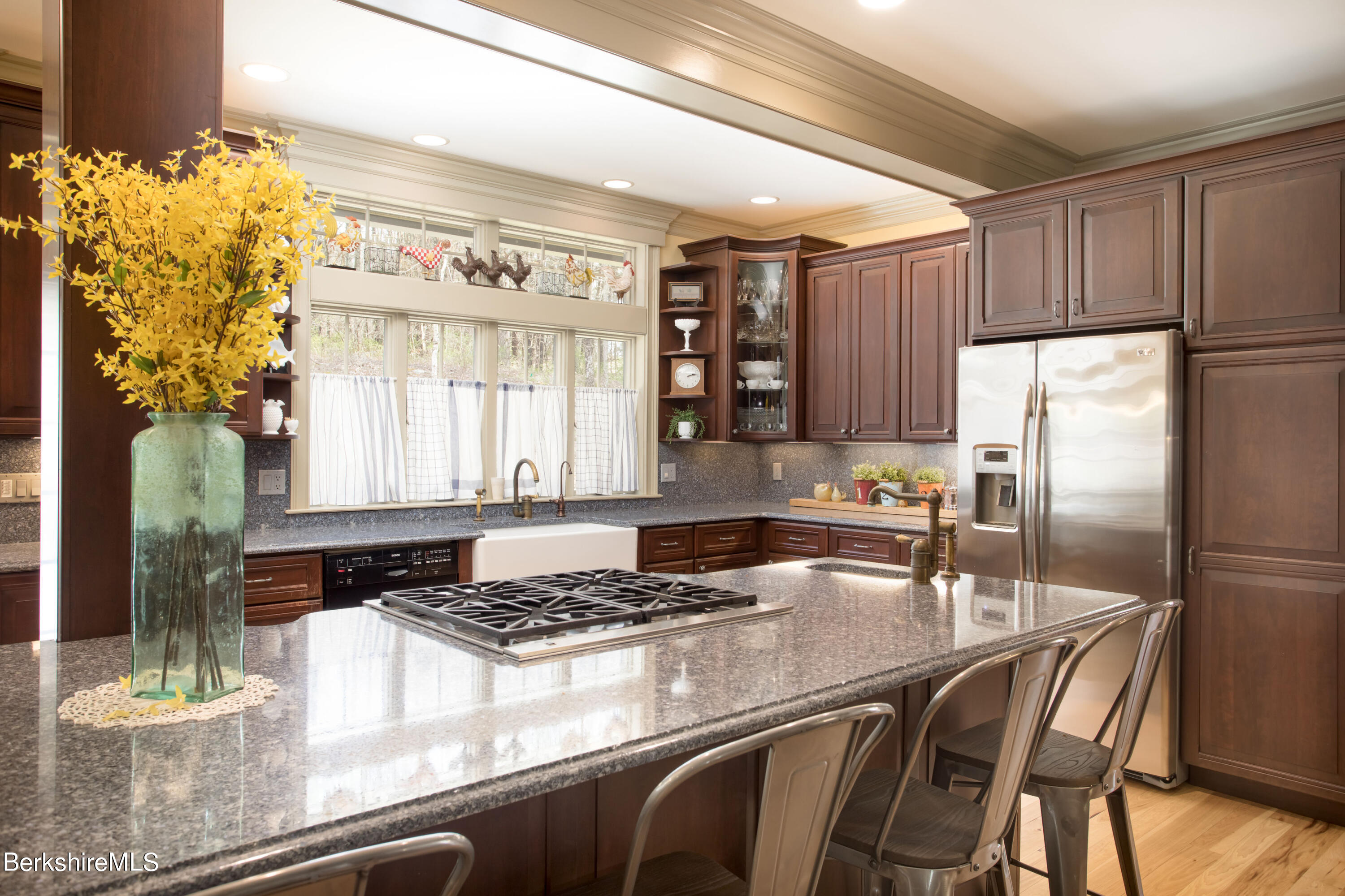 357 Twin Lakes Road Salisbury, CT 06068 - Photo 9 of 31 a kitchen with granite countertop a refrigerator a stove a sink dishwasher and microwave oven