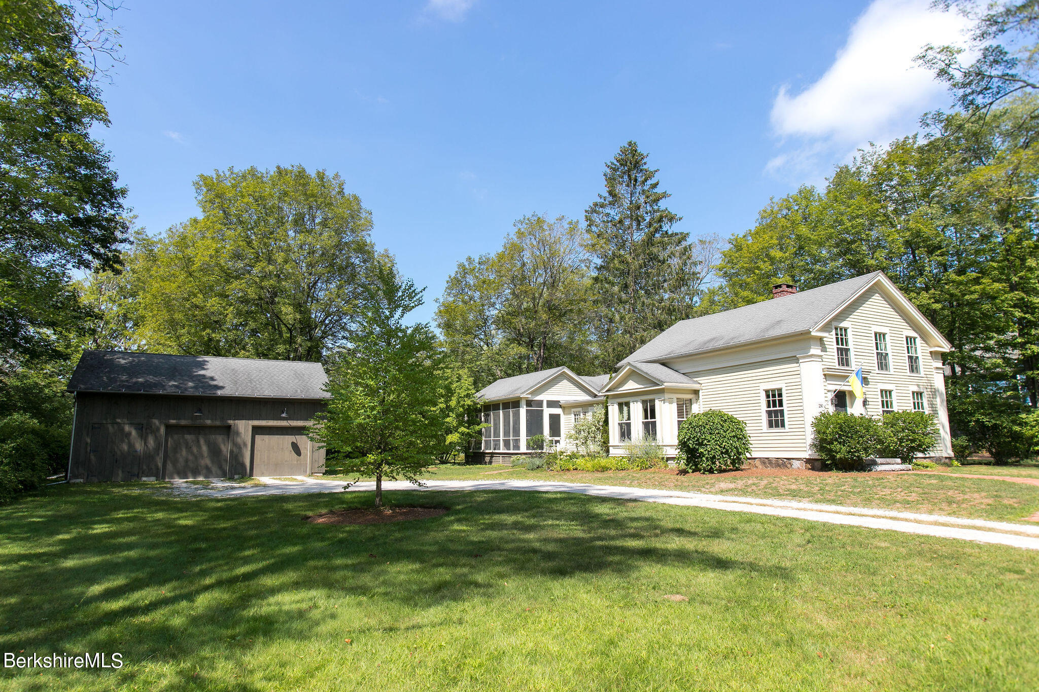 250 East Main Street Sheffield, MA 01222 - Photo 1 of 50 a front view of a house with a garden