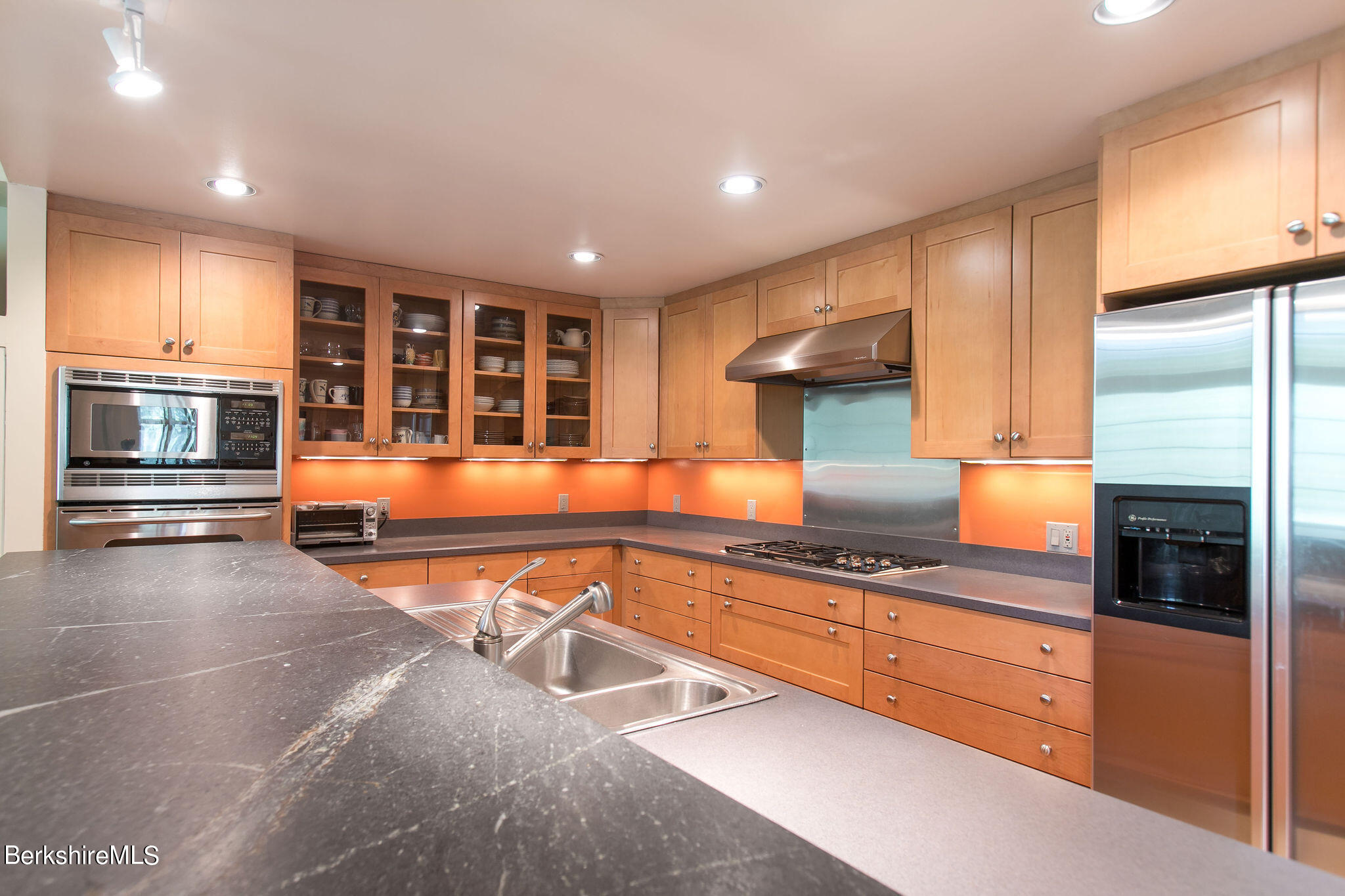 250 East Main Street Sheffield, MA 01222 - Photo 16 of 50 a kitchen with stainless steel appliances granite countertop a stove and a refrigerator