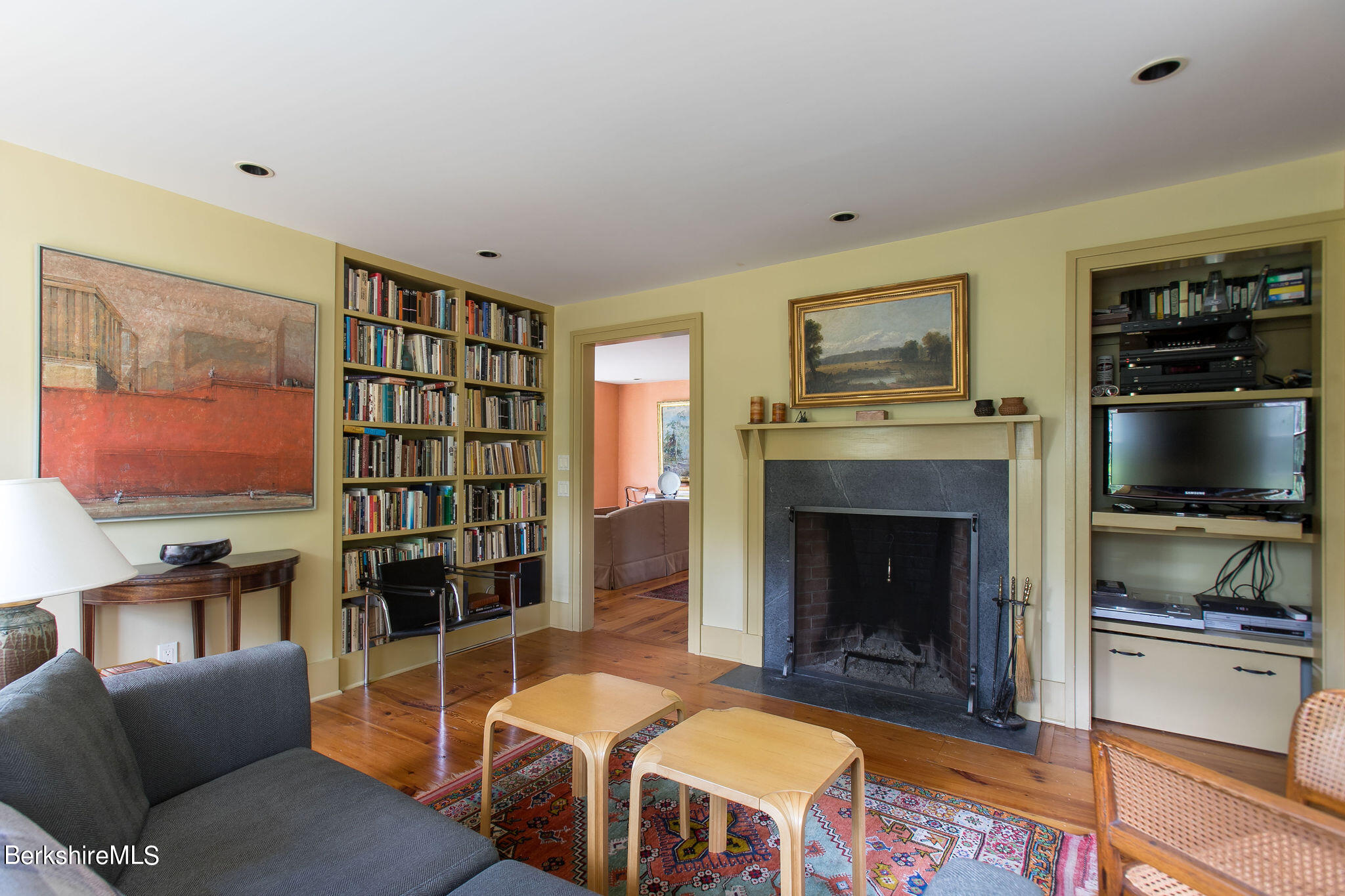 250 East Main Street Sheffield, MA 01222 - Photo 20 of 50 a living room with furniture a flat screen tv and a fireplace