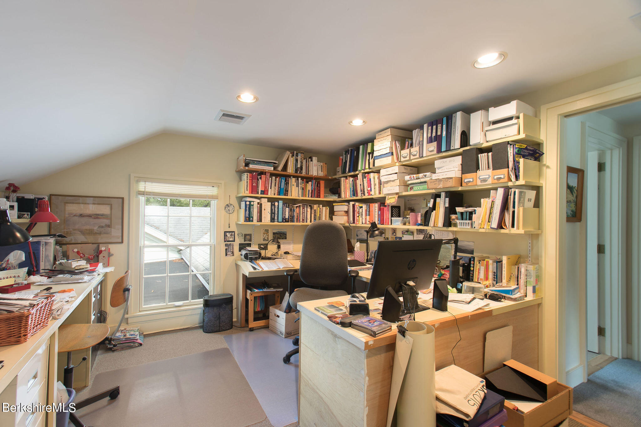 250 East Main Street Sheffield, MA 01222 - Photo 32 of 50 a view of a workspace with furniture and a bookshelf