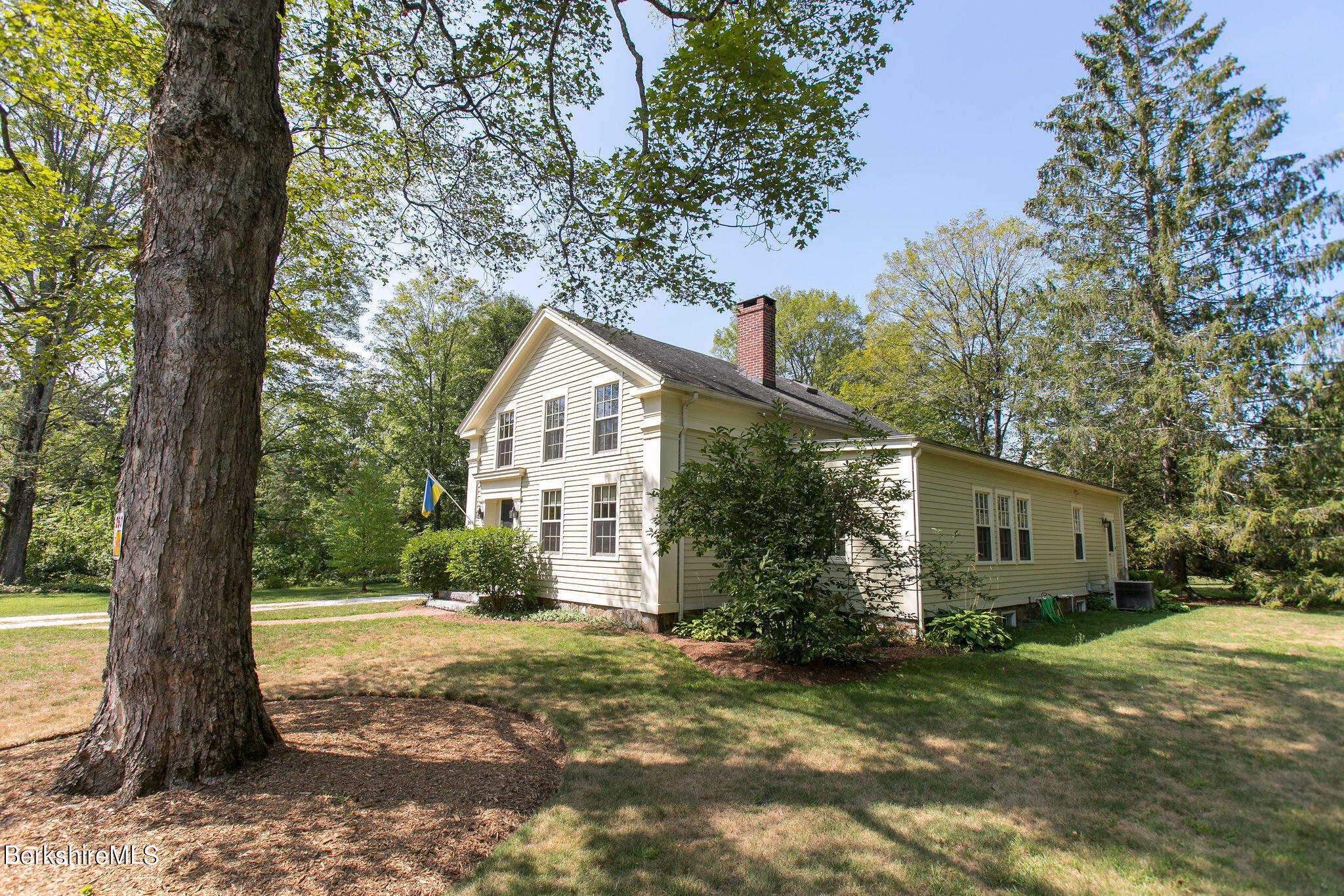 250 East Main Street Sheffield, MA 01222 - Photo 35 of 50 a view of a house with a tree in the forest