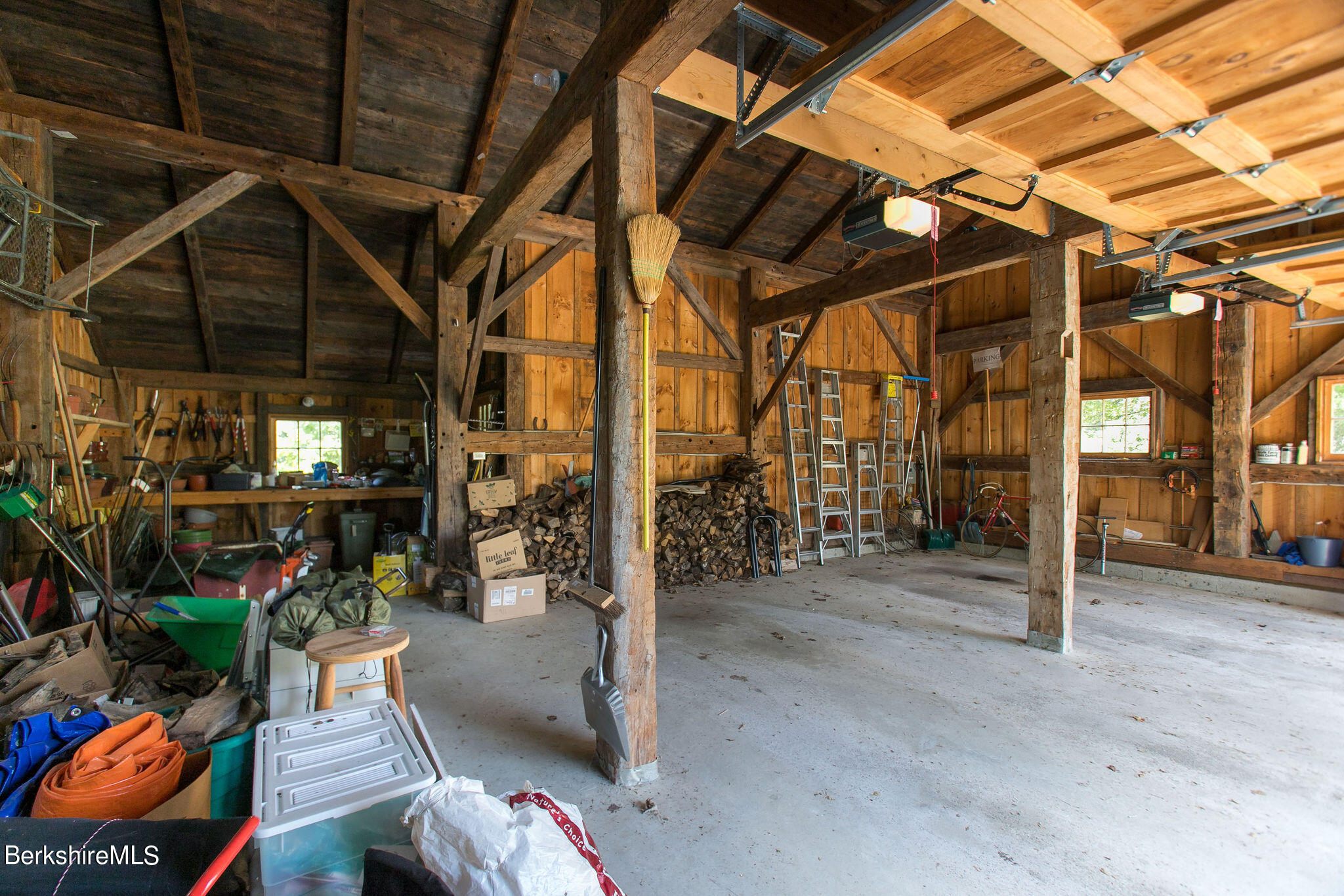 250 East Main Street Sheffield, MA 01222 - Photo 40 of 50 a view of a garage with wooden table and chairs