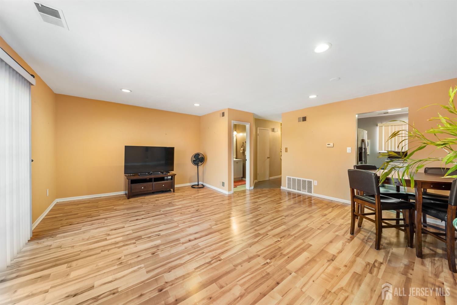 91 Redbud Road Piscataway, NJ 08854 - Photo 11 of 22 a view of kitchen with furniture and wooden floor