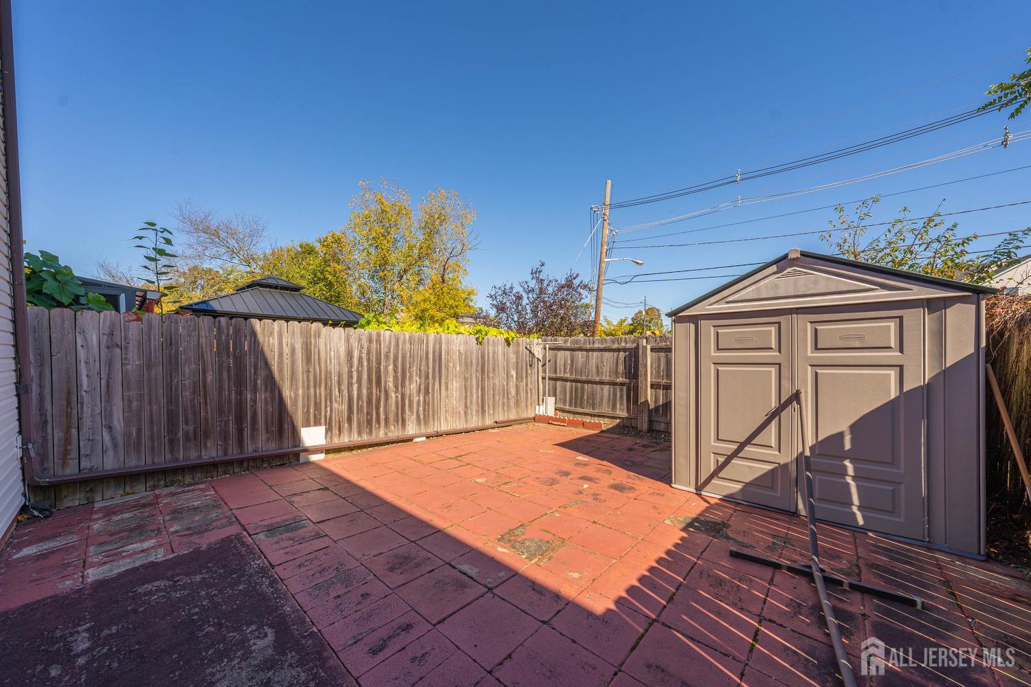 91 Redbud Road Piscataway, NJ 08854 - Photo 18 of 22 a backyard of a house