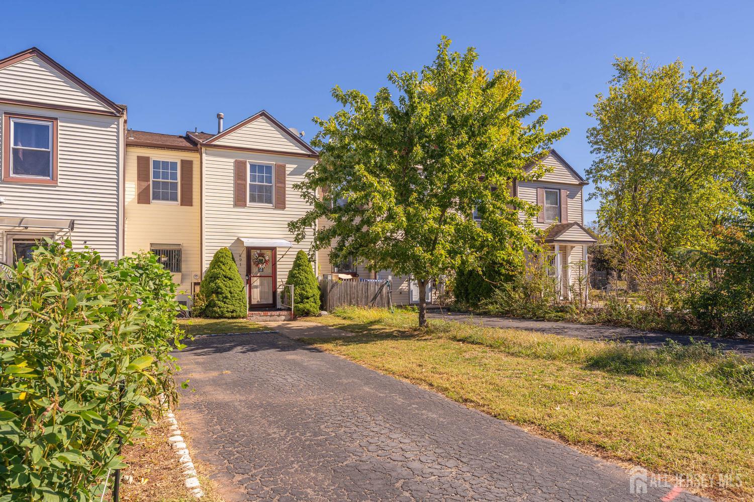 91 Redbud Road Piscataway, NJ 08854 - Photo 4 of 22 a front view of house with yard