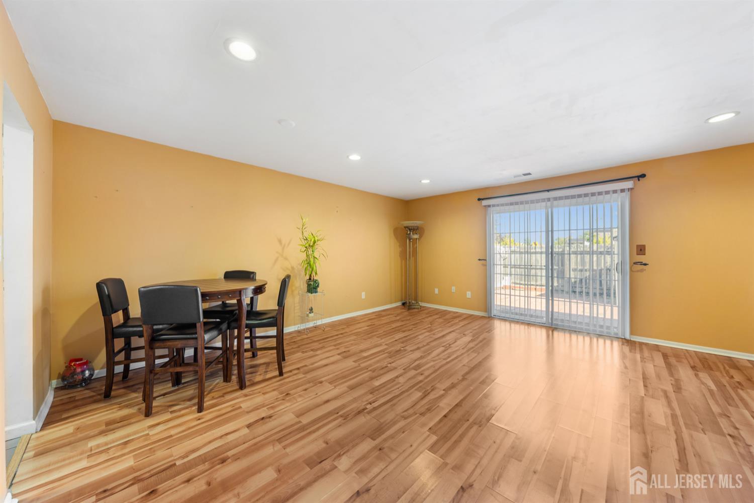 91 Redbud Road Piscataway, NJ 08854 - Photo 10 of 22 a view of a dining room with furniture and wooden floor