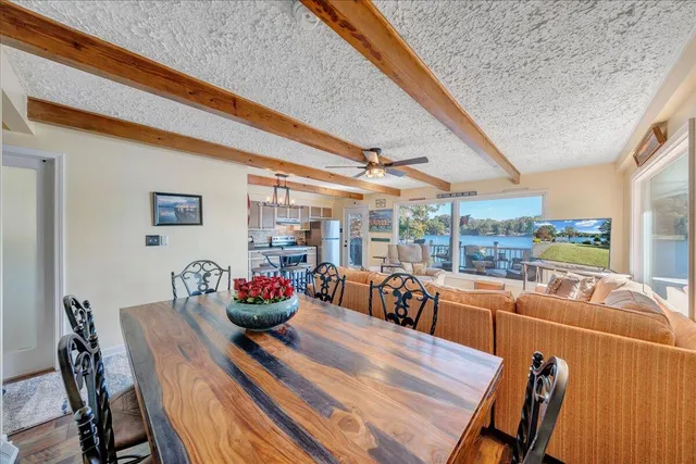 a view of walk in closet with clothes