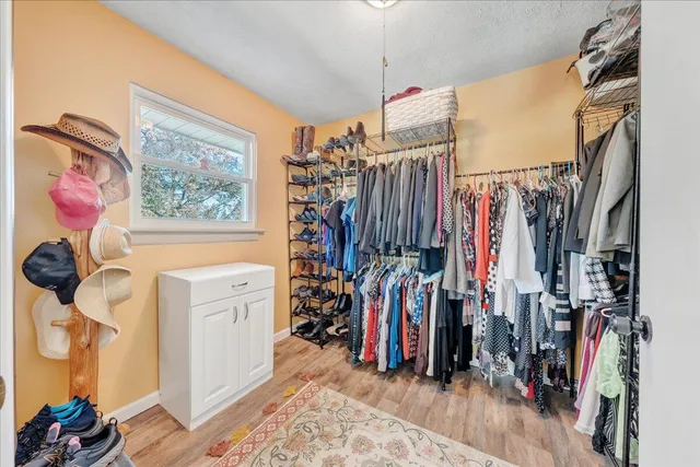 an aerial view of a house with outdoor space and street view