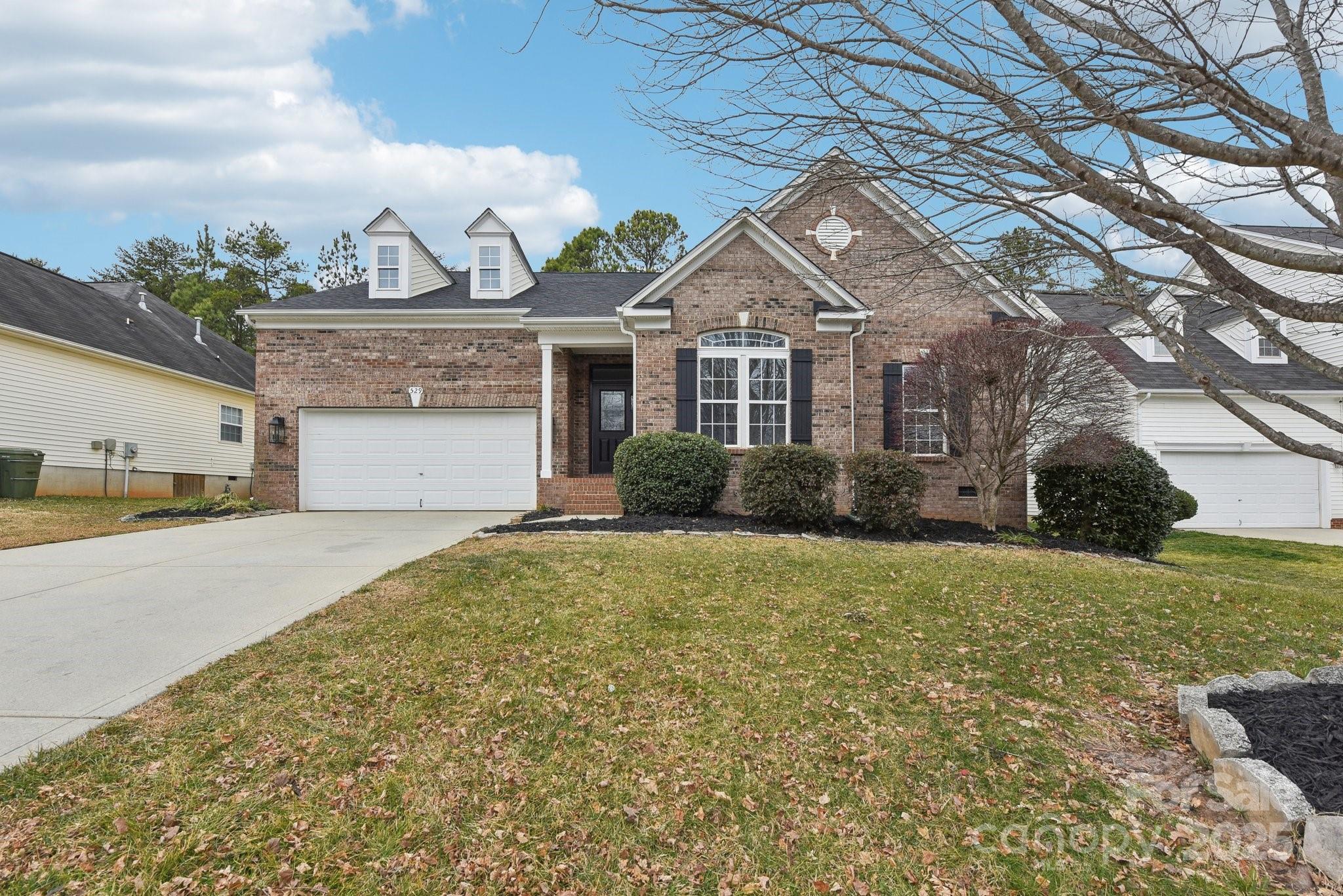 529 Veloce Trail Fort Mill, SC 29715 - Photo 2 of 40 a front view of a house with a yard and garage