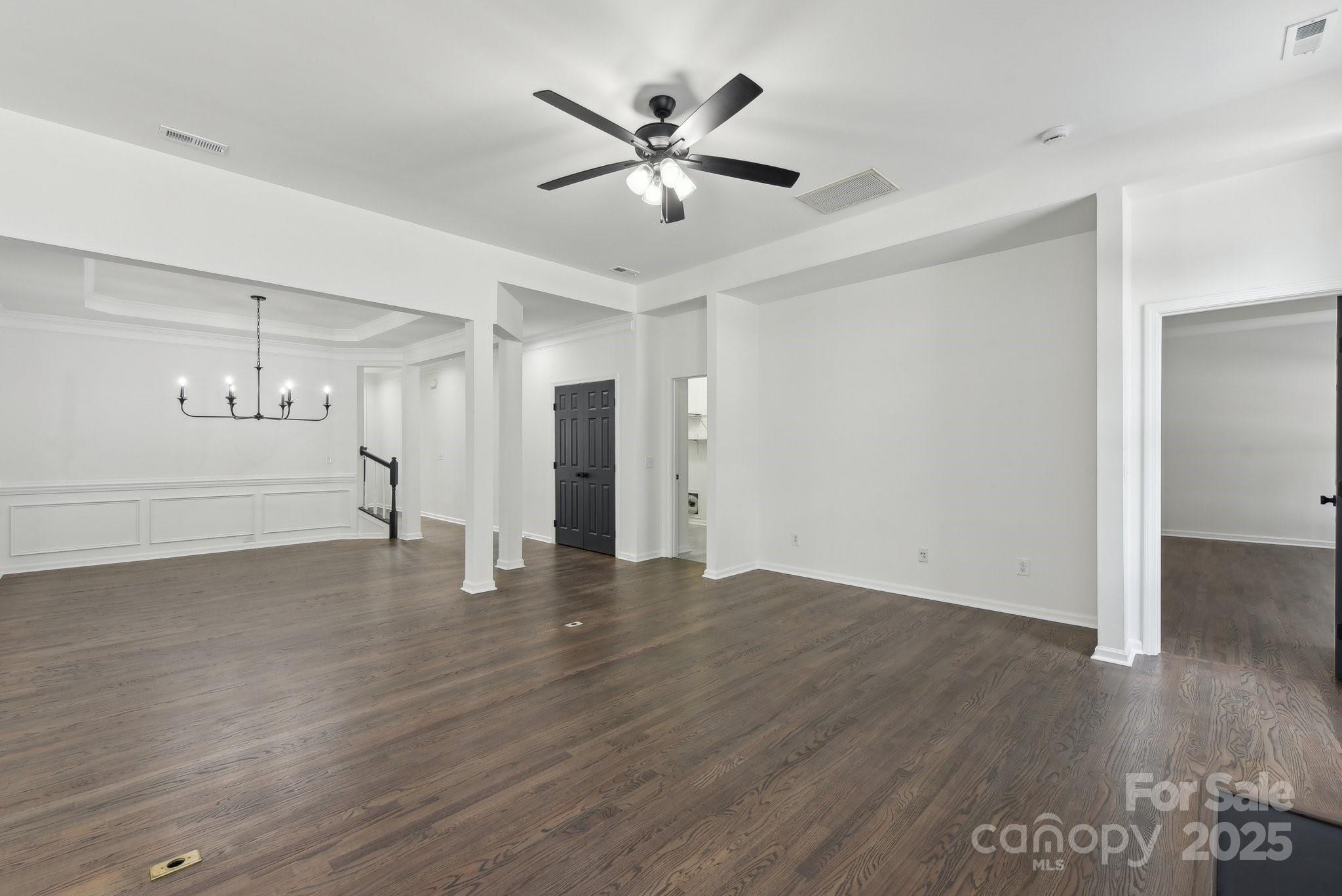 529 Veloce Trail Fort Mill, SC 29715 - Photo 21 of 40 a view of an empty room with wooden floor