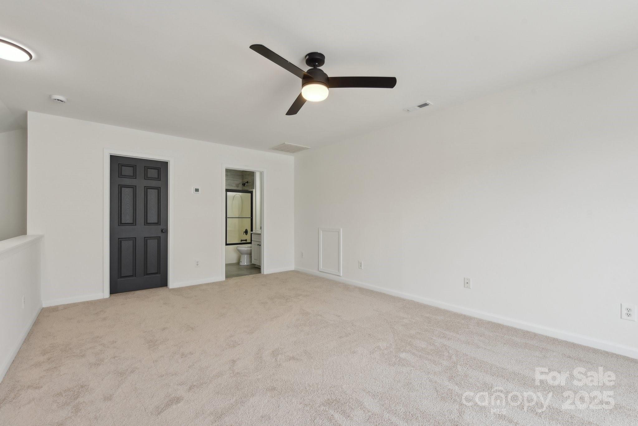 529 Veloce Trail Fort Mill, SC 29715 - Photo 33 of 40 a view of a big room with closet and ceiling fan